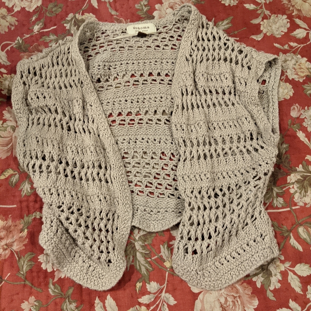 Tan shrug